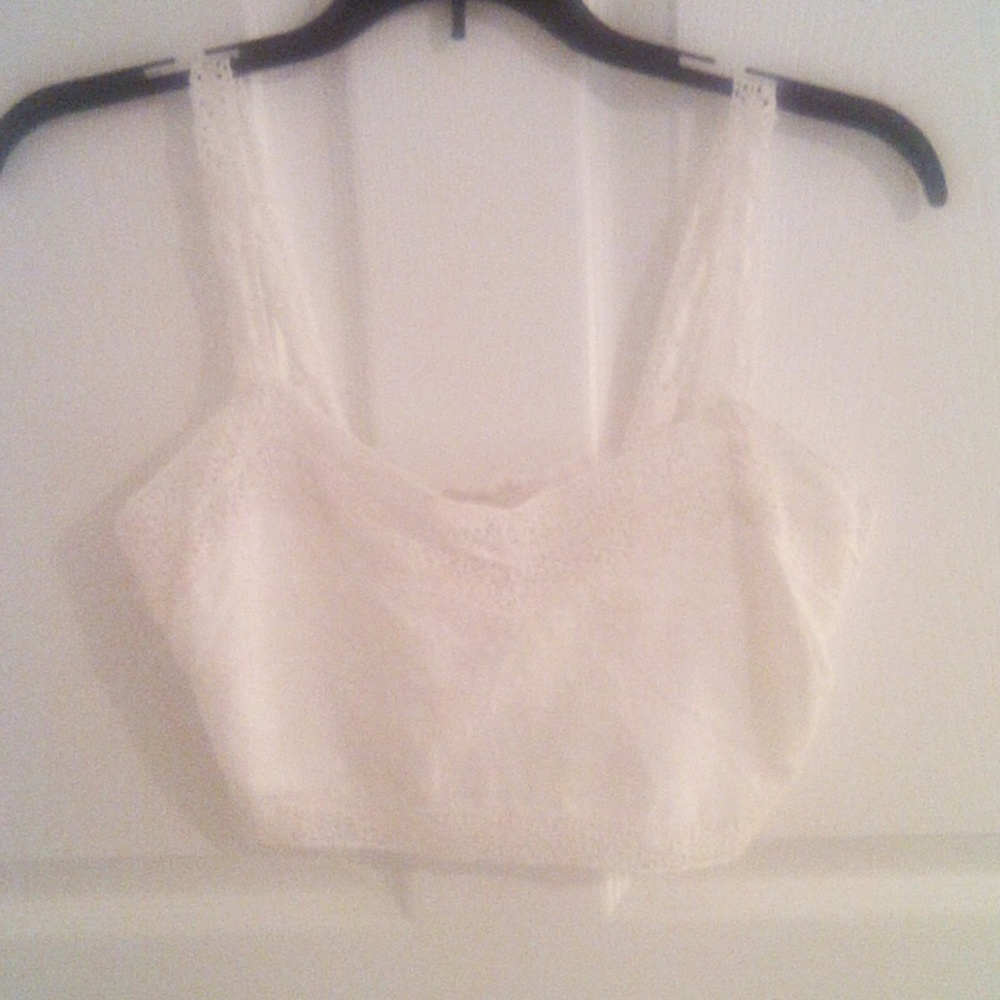 A crocheted white cropped top tank. Very sweet looking.